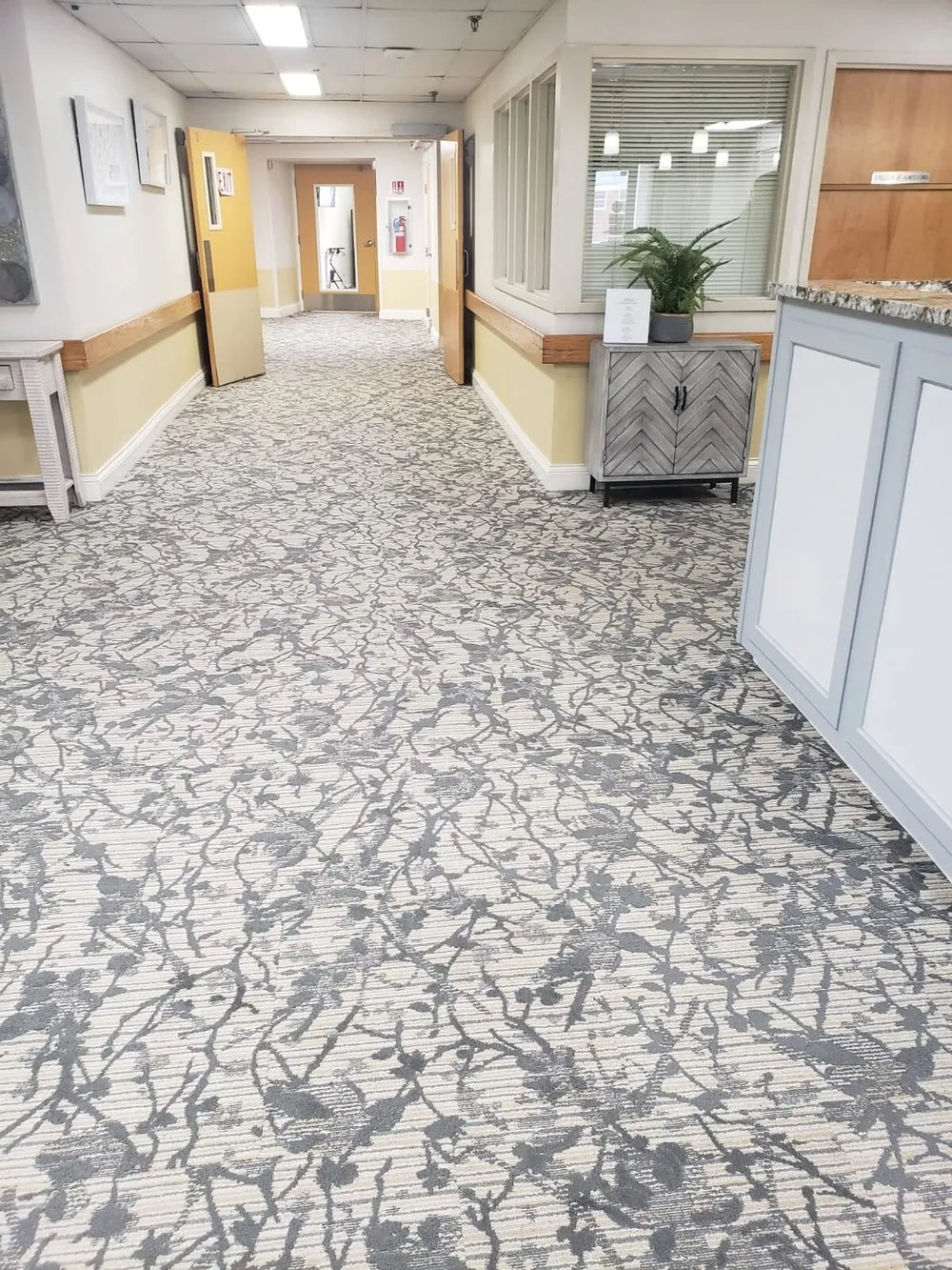 Patterned carpet in a care-center corridor at Bala Nursing and Rehabilitation.