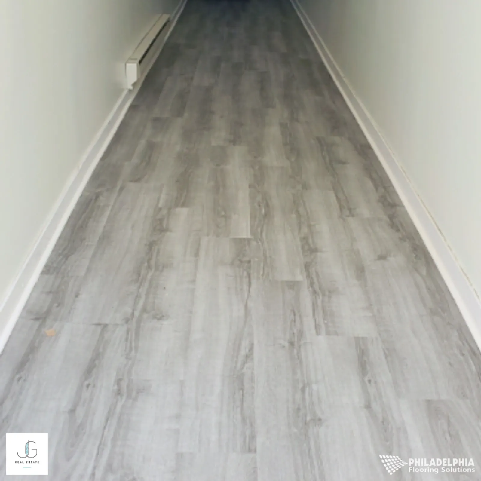 Flooring installed for JG Real Estate.