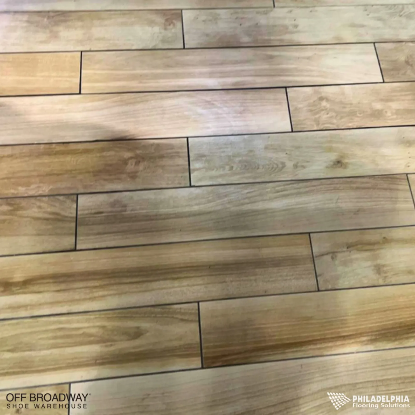 Flooring installed for Off Broadway Shoes.