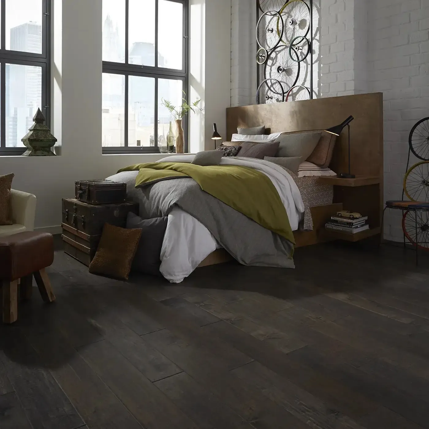 Reference photograph of a bedroom with dark wood flooring. This is not a PHLFS project.